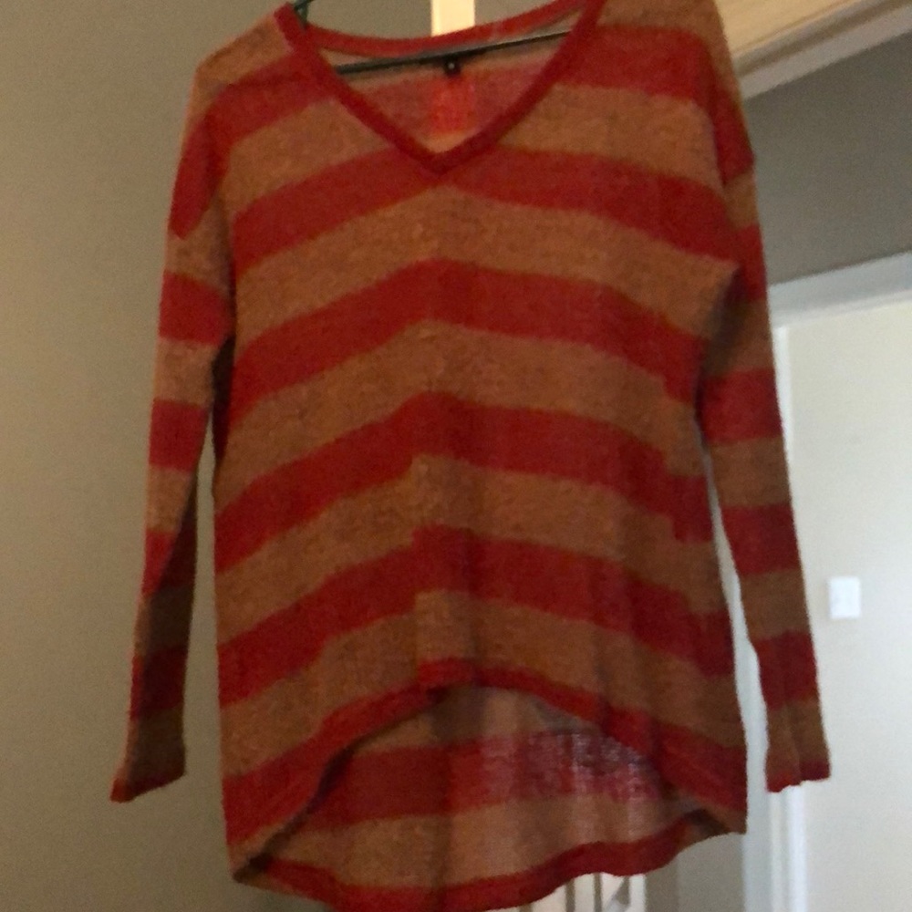 Red and tan sweater
